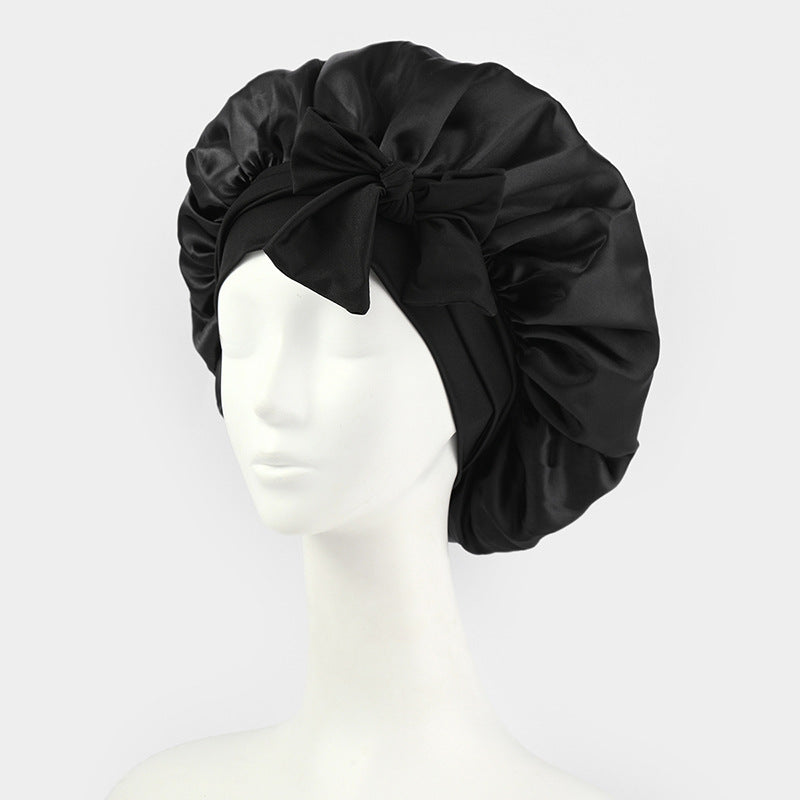 Wide-edge elastic band sleep cap