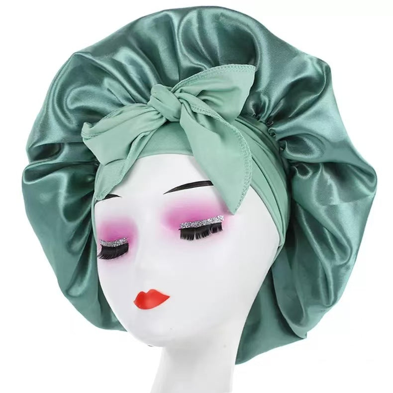 Wide-edge elastic band sleep cap